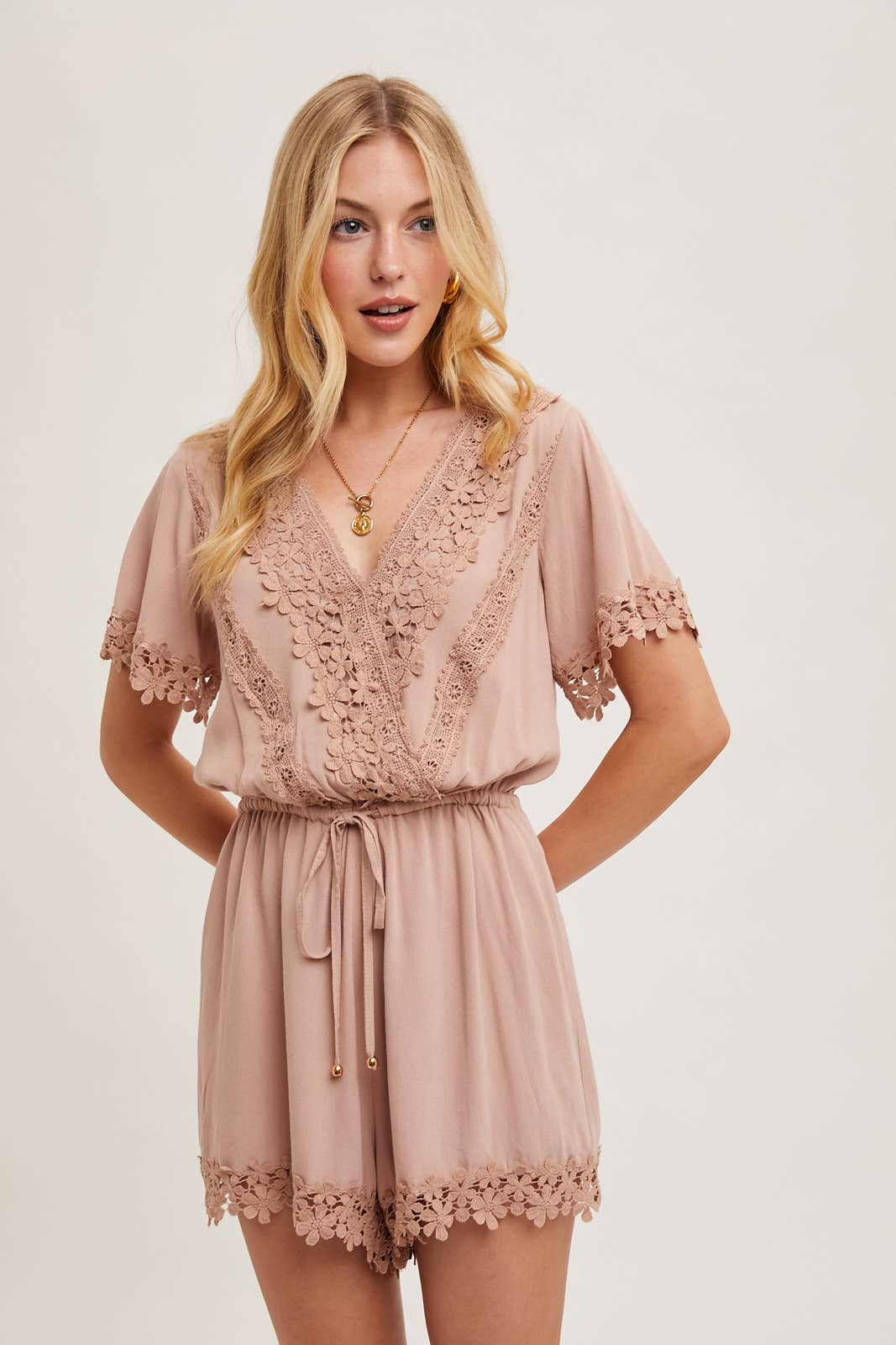 WRAP FLORAL LACE TRIMMED DRAWSTRING ROMPER: ALMOND